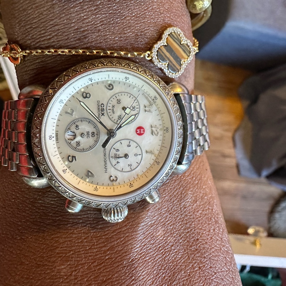Authentic used Michele watch with diamond face. Well loved. Missing the M